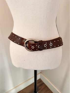 Brown Leather Belt with Silver Eyelets and Round Buckle, Approximately 42 Inches